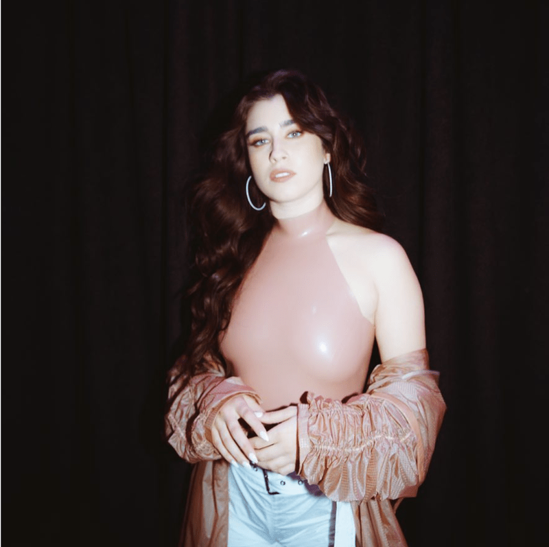 Lauren Jauregui wearing tight rubber top Lauren Jauregui wearing tight rubber top